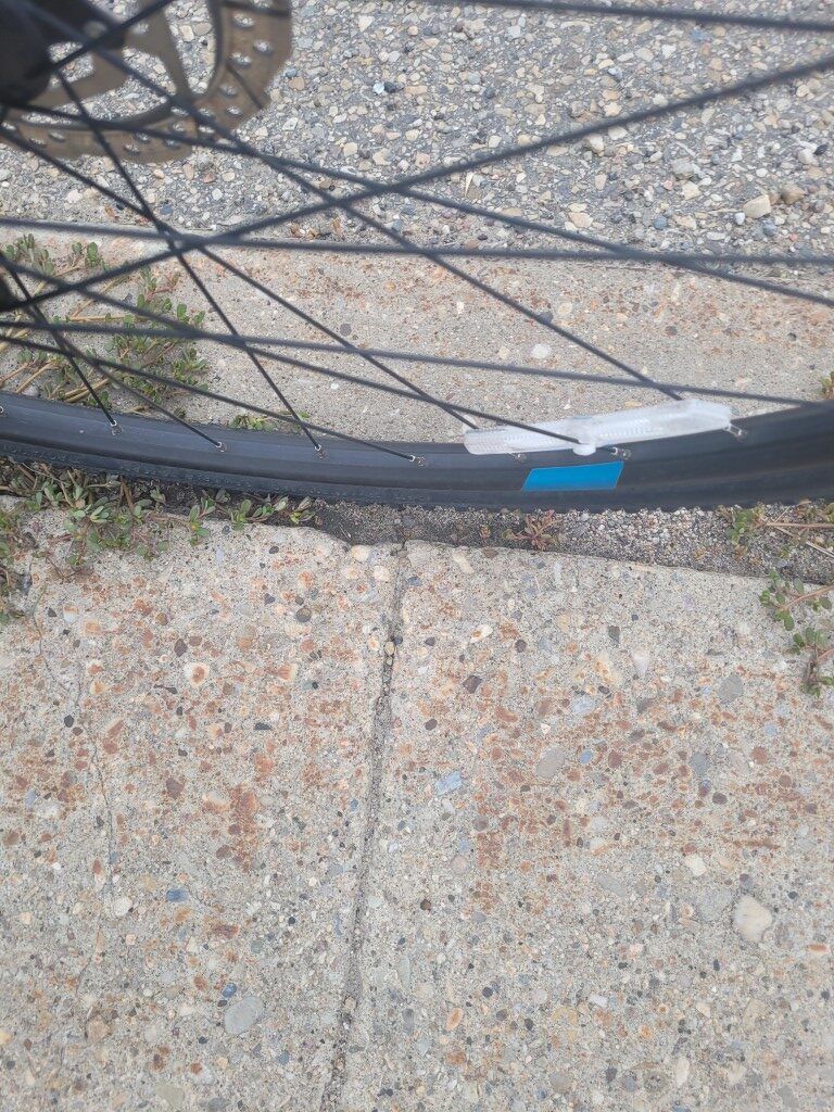 Large gap between sidewalk and curb - can eat a whole bike tire